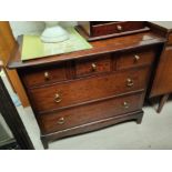 A Stag Minstrel chest of 2 long and 3 short drawers; a bedside cabinet;