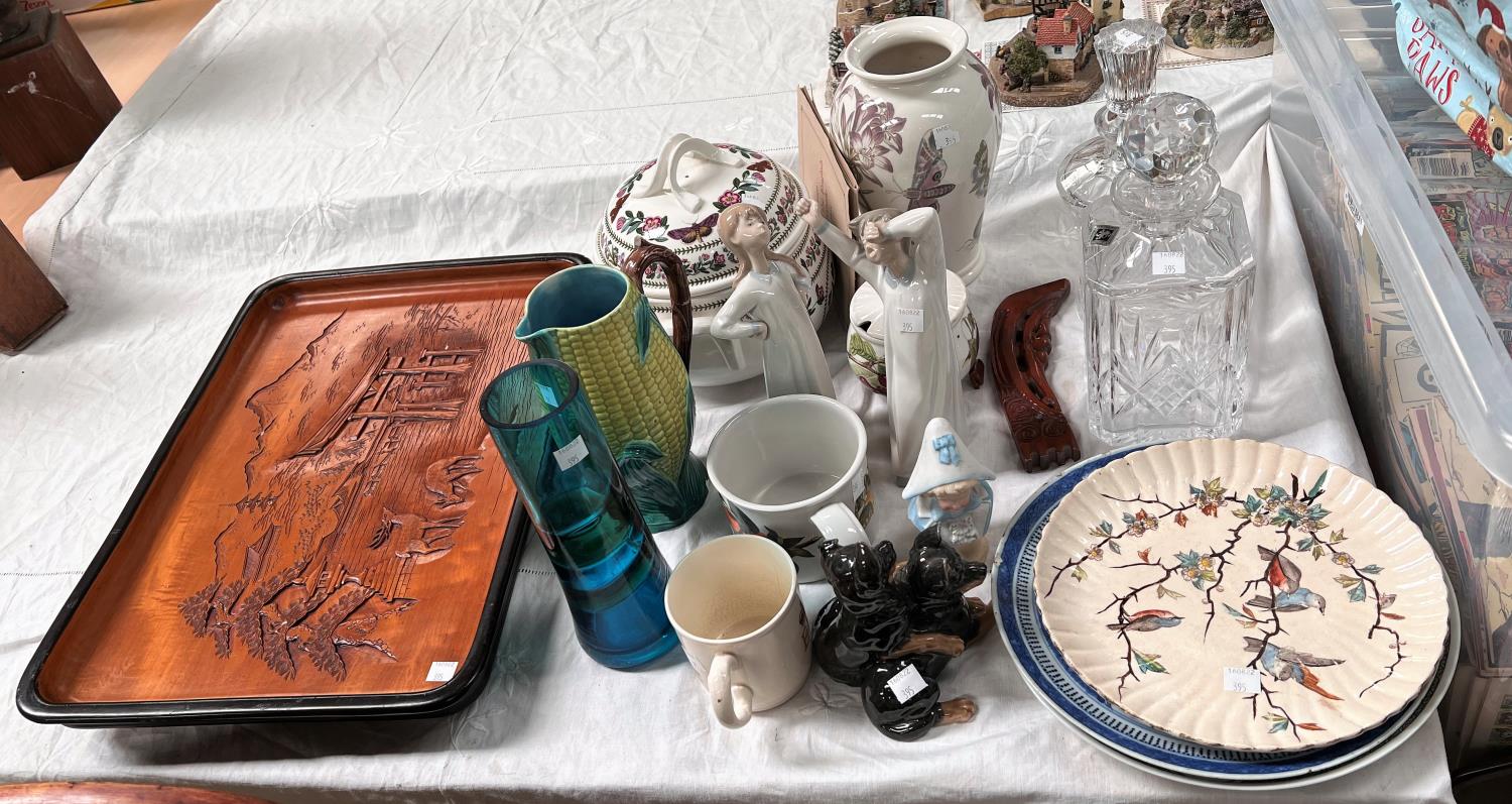 A selection of decorative pottery including 2 Lladro figures, Portmeirion and Majolica