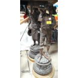 A large pair of 19th century bronzed spelter figures, male & female agricultural workers (man's