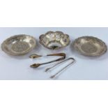 A hallmarked silver pierced and embossed bonbon dish, marks worn; a continental set of 6 teaspoons