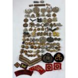 A selection of various military badges etc