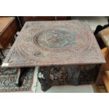 An oriental occasional table with extensively carved square top