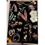 Approximately 24 pairs of silver and white metal earrings, most marked 925, some gem set.