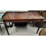 A Georgian mahogany side/serving table in the manner of Gillows, with short gallery, on turned