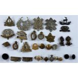 A selection of military badges etc