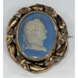 A Victorian gilt metal brooch/swivel locket set blue Jasperware classical gent's profile head
