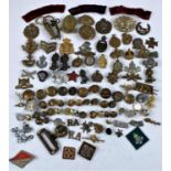 A selection of various military badges etc