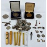 A "Maria Theresa" silver coin & other; a white metal charm bracelet etc.