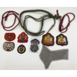 A  selection of cloth  military badges etc