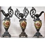A Victorian style 3 piece garniture comprising central vase and 2 ewers, with porcelain bodies and
