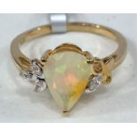 A 9 carat hallmarked gold dress ring, set with a pear shaped Ethiopian cut opal 10 x 7mm, 1.12 carat