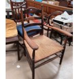 a 19th century beech rush seat ladder back armchair and a Cromwellian style dining chair