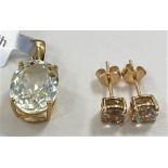 A pair of 9 ct gold Czarite stud earrings (1.1 carat) gold weight 0.77gm; a 9ct gold pendant set