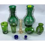 A pair of Mary Gregory green glass vases decorated with boy hunter and stags, height 25cm (1