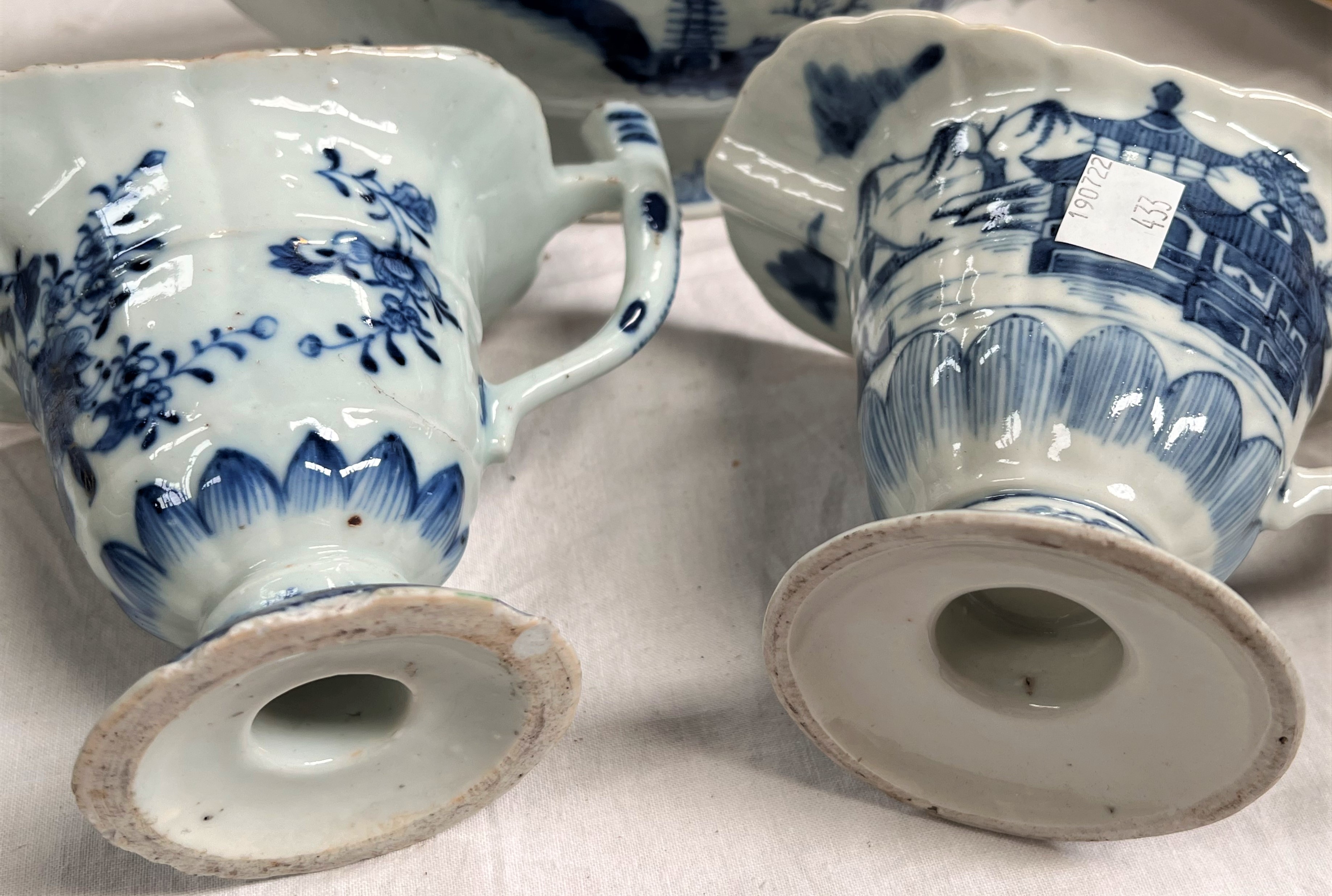 A 19th century Chinese pair of blue & white jugs decorated with pagodas, height 13cm; a similar - Image 2 of 7