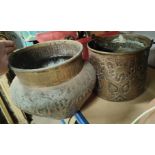 A Middle Eastern large embossed brass jardinière; a similar copper bucket