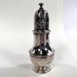 An early Georgian hallmarked silver baluster sugar dredger, London 1726, height 13cm