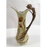 J.B.T. ANNO 1906, Art Nuveau style ceramic jug with brass mermaid handle, height 23cm.