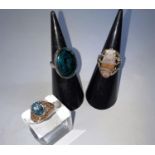 A hallmarked silver lady's dress ring set with oval abalone shell; 2 yellow metal rings, 1 set
