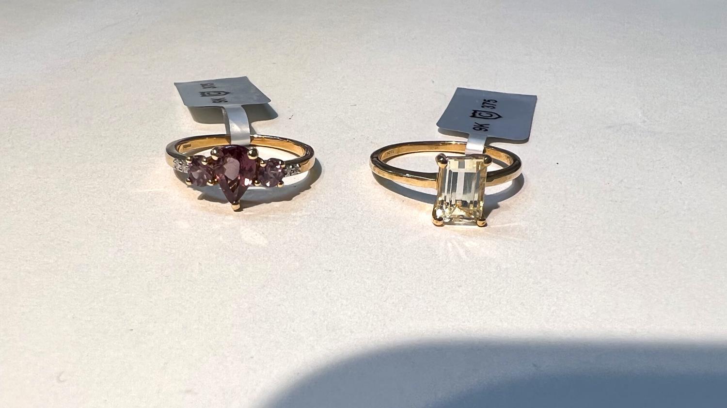 2 9 carat hallmarked gold dress rings, 1 set with 3 colour change garnets and 4 small diamonds,