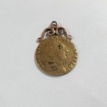 A George III Spade half Guinea 1788 with soldered mount, 4.88gm gross