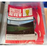 A selection of 1960's/70's Manchester United and Manchester City programmes etc
