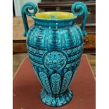 A large majolica style vase by Linthorpe, of baluster form with twin scroll handles, in turquoise