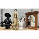 A selection of decorative items:  a resin figure of a Japanese woman; a plaster Black Boy holding