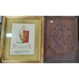 A 19th century Hewetson family crest, framed; another in carved oak, 44 x 32cm; a related family