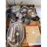 A selection of silver plate:  two 3 piece tea sets; boxed cutlery; souvenir spoons; etc.