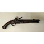 An Austrian Military flintlock pistol with brass mounts, fish tail stock, brass side tangs and