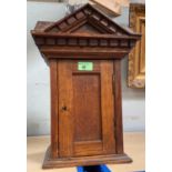 An oak "Tabernacle" table top cabinet, height 40cm
