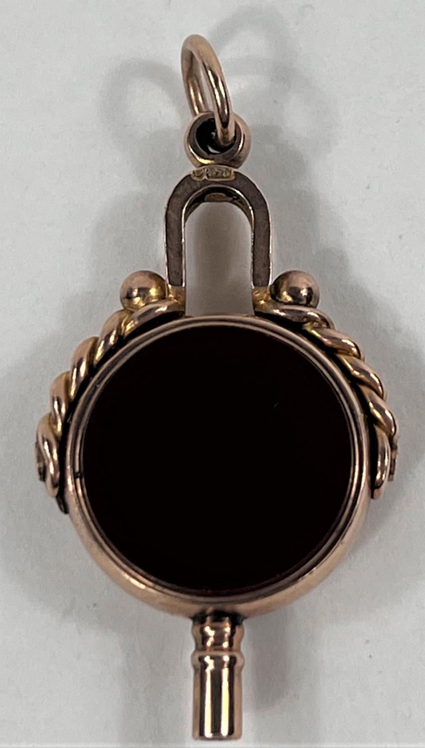 A Victorian 9ct hallmarked watch fob set cornelian and bloodstone agate, Birmingham 1891