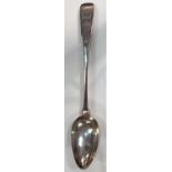 A Georgian silver Irish basting spoon, fiddle pattern, with crest for Johnson family, County Cork,
