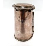 A George III early 19th century silver lidded hunting tankard with hinged strapwork folding