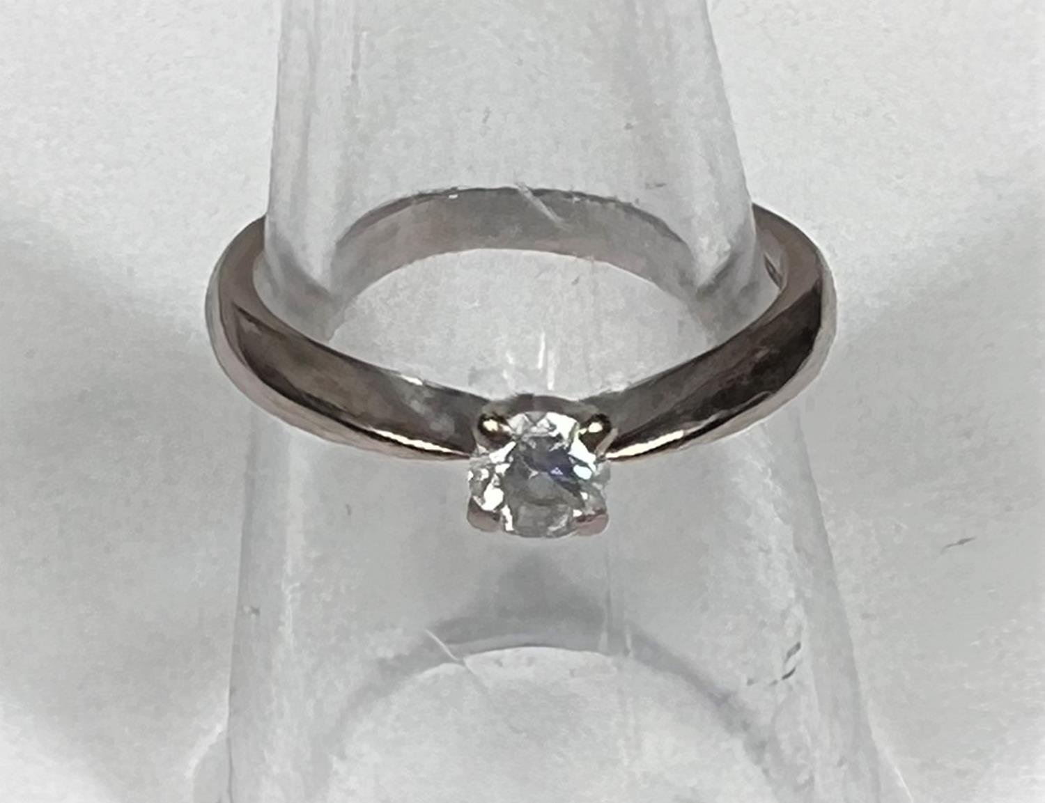 An 18 carat hallmarked gold diamond solitaire ring, 3.7 gm, diamond 4 mm approx