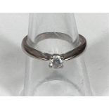 An 18 carat hallmarked gold diamond solitaire ring, 3.7 gm, diamond 4 mm approx