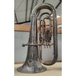 A large silver plated tuba