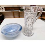 A Kosta Boda heavy studio glass bowl with pale blue and white swirls within blue clear body, width