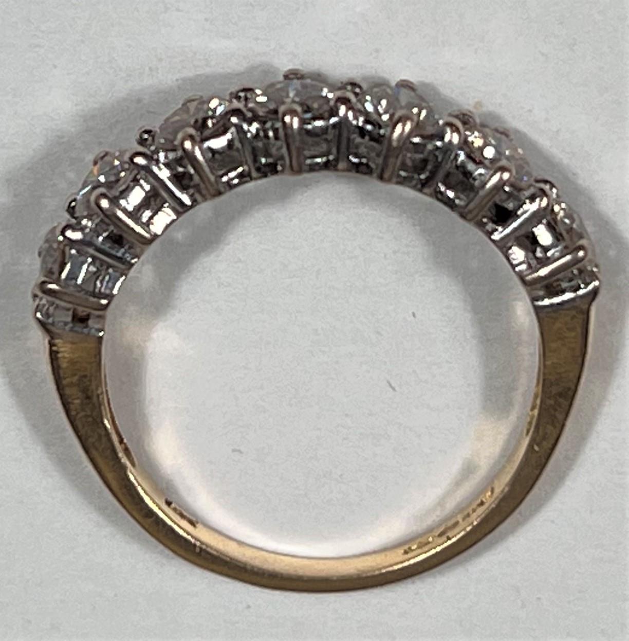 An 18 carat hallmarked gold half eternity ring set 7 diamonds, 3.5mm diameter of stones approx - Image 5 of 7