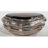 A 19th century continental silver snuffbox of cushion form, polished veined agate top, reeded