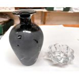 A clear glass lobed dish by DAUM, with etched signature, max. width 10.5cm; a black glass baluster