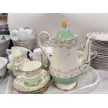 Three part tea services; Wedgwood Blue Anemone, a Danish floral set and a Paragon 1930's green and