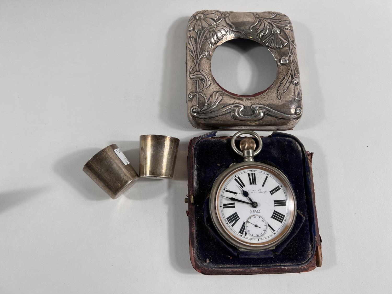 A large keyless open faced pocket watch in Art Nouveau embossed hallmarked silver overnight case,