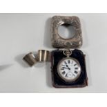 A large keyless open faced pocket watch in Art Nouveau embossed hallmarked silver overnight case,