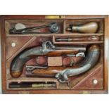 A cased pair of 19th century Irish travelling pistols by Trulock & Son, Dublin, engraved to top of