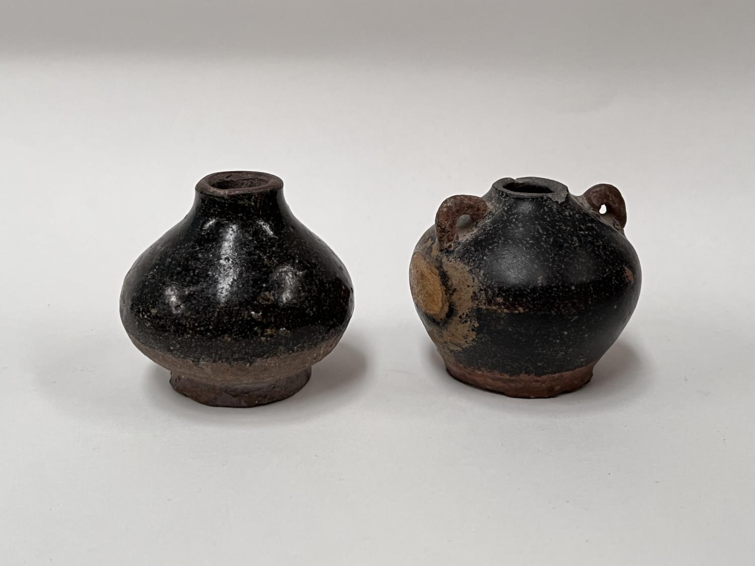 A Chinese small ceramic whistle; 2 Cambodian small vases with dark mottled glaze, possibly Khmer,