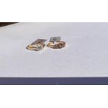 2 9 carat hallmarked gold dress rings, 1 set with central blue diamond, 0.14 carat surrounded by