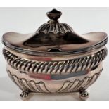 A George III silver mustard pot, boat shaped, parcel gilt interior, gadrooned frieze, London,