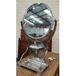 A modern Secessionist style dressing table mirror in circular silvered frame, height 80cm